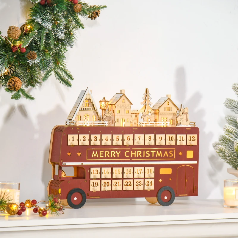 Red bus-shaped advent calendar with glowing village houses on top.
