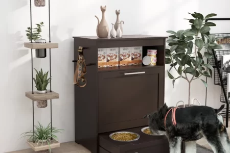 Dark wood pet feeding station and storage cabinet, Schnauzer eating.