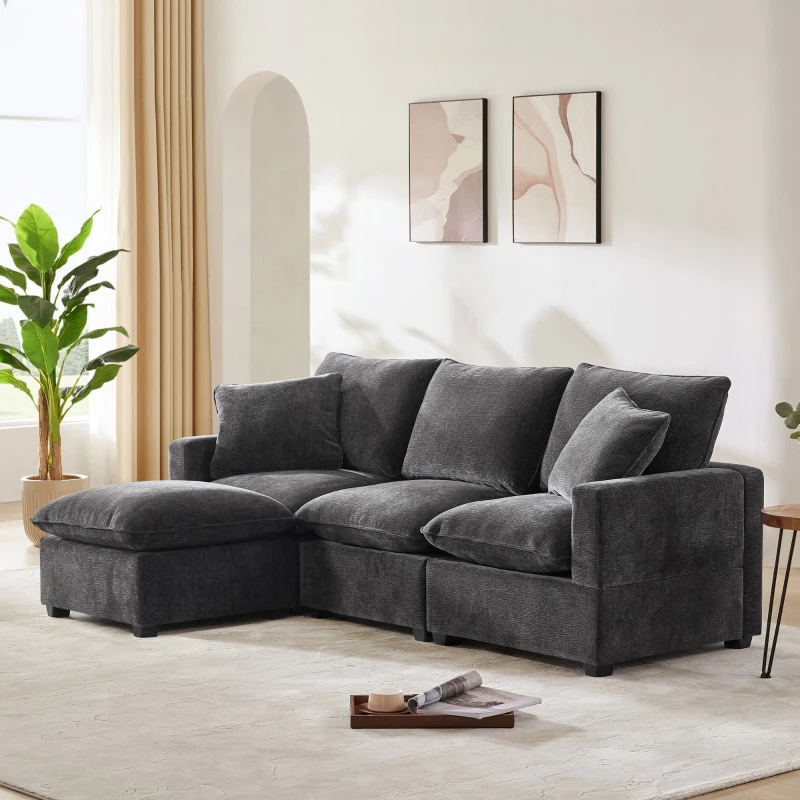 Charcoal grey chenille sectional sofa with soft cushions in airy room.