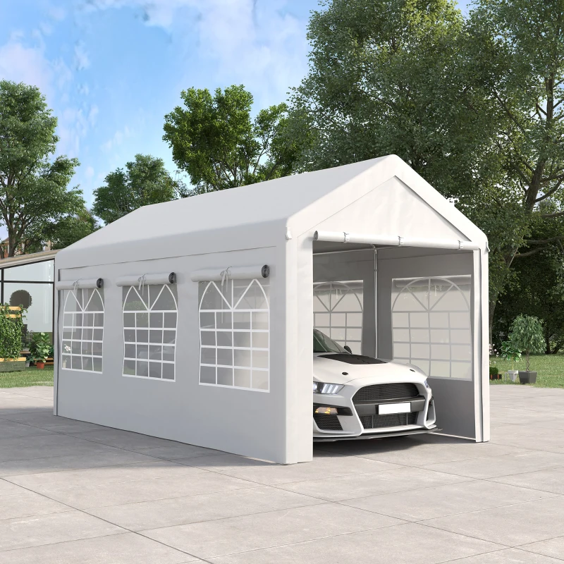 White carport shelter with car parked inside on paved driveway.

