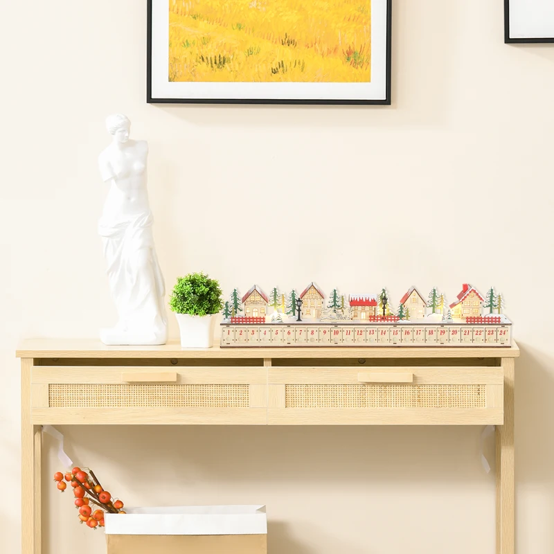 Wooden advent calendar on console table with miniature winter houses.
