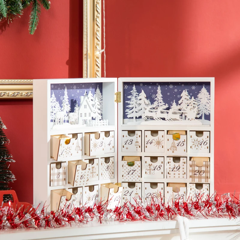 White advent calendar box with reindeer and snowy village backdrop.