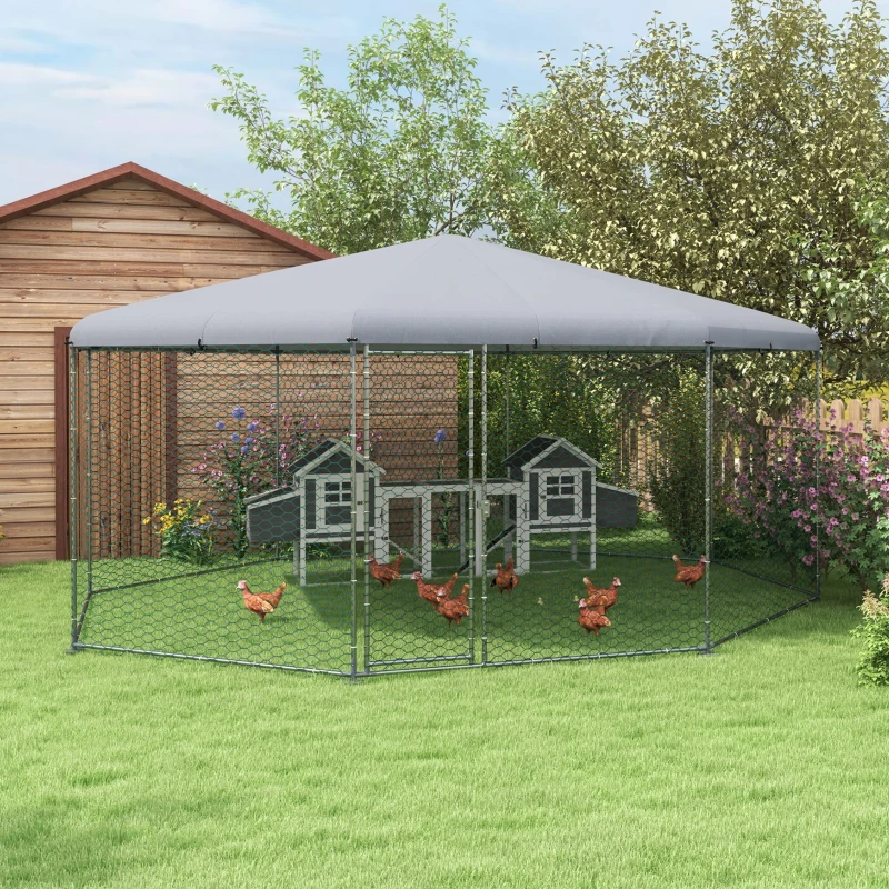 Octagonal walk-in chicken run with a gray canopy roof and two small coops inside.