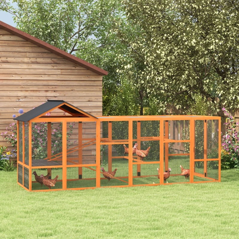 Long, reddish-brown wooden chicken run extension with a black-roofed section and ramp.
